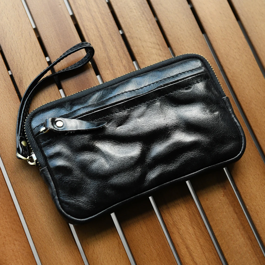 头层牛皮拉链手拿包真皮休闲散步随身手机包钱包收纳包手拎包实用