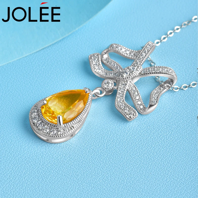 Jolee项链女黄水晶蝴蝶结吊坠S925银锁骨链送女生节日礼物