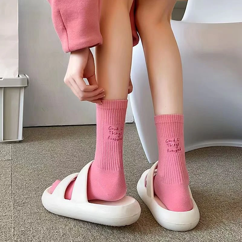 情侣潮流中筒袜春秋时尚百搭纯色学生外穿网红后跟字母女士堆堆袜