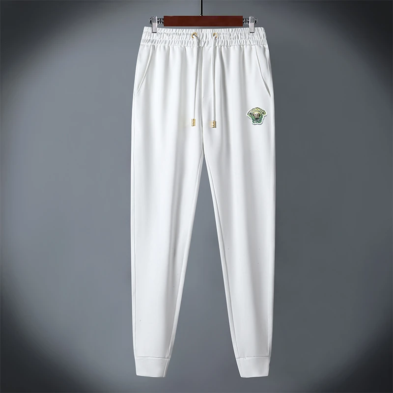 美杜沙范思VERSAC男士夏季薄款冰丝时尚烫钻休闲裤束脚运动长裤