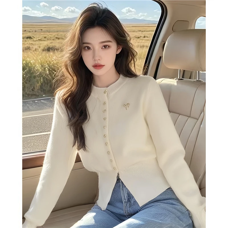 韩版高级感泡泡袖针织衫女款气质服装别致漂亮小衫职业通勤上衣