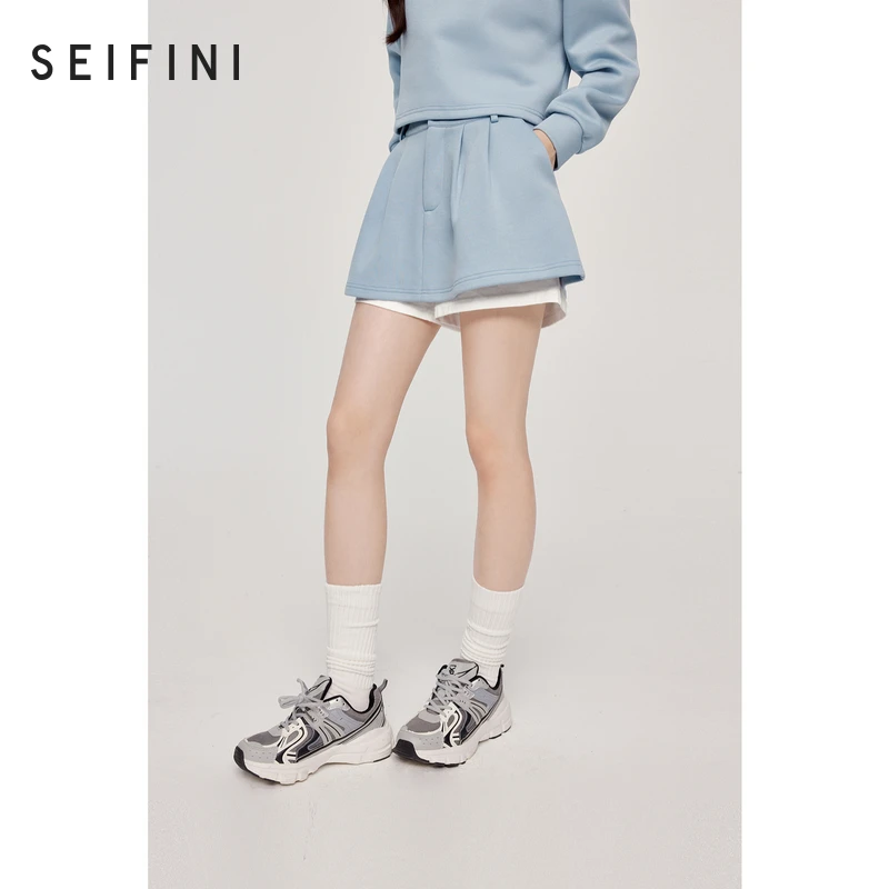 诗凡黎撞色拼接假两件A字休闲裙2024秋新款设计感遮胯显瘦半身裙