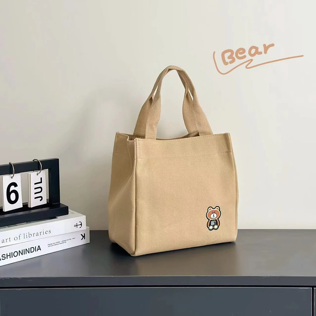 新款简约手提包时尚女包大容量妈咪包上班族便携手提袋加厚帆布包