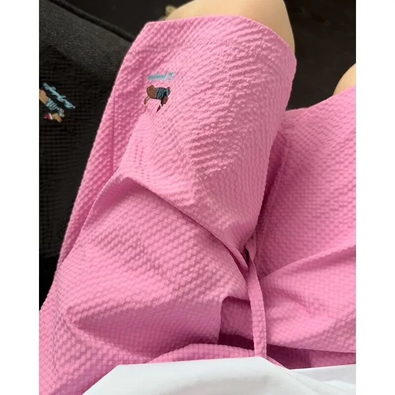 2025年夏季新款青少年泡泡纱多巴胺刺绣腊肠狗百搭宽松防水短裤