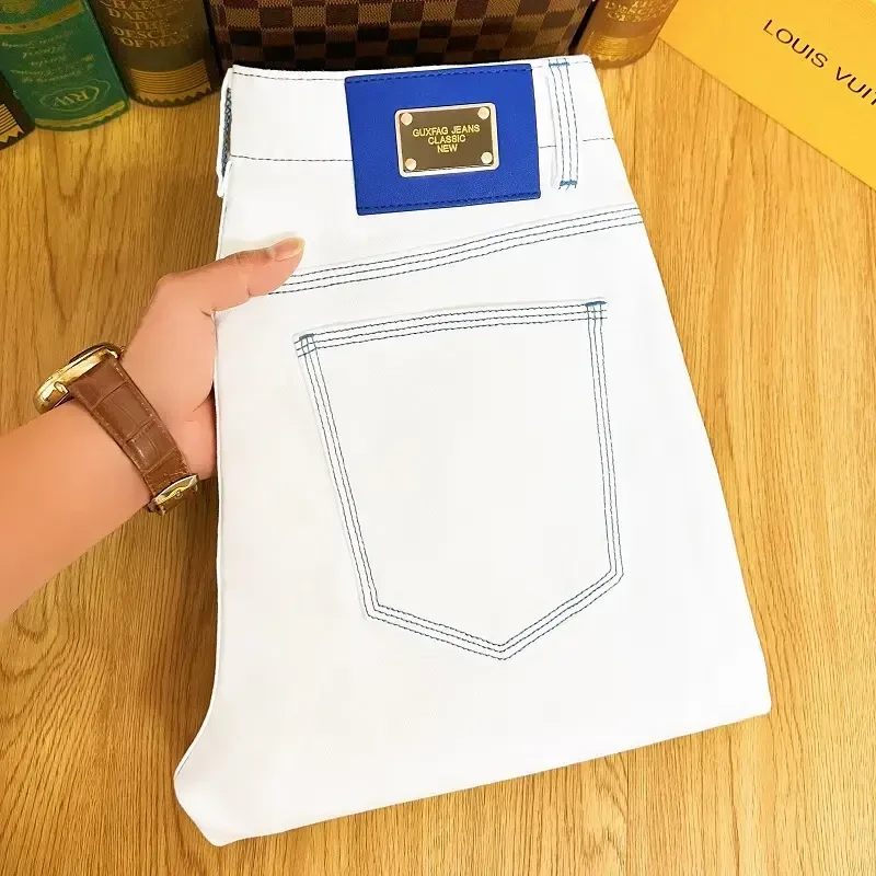 夏季新款白色牛仔裤男克莱因蓝高端潮牌亲肤弹力修身小脚九分裤男