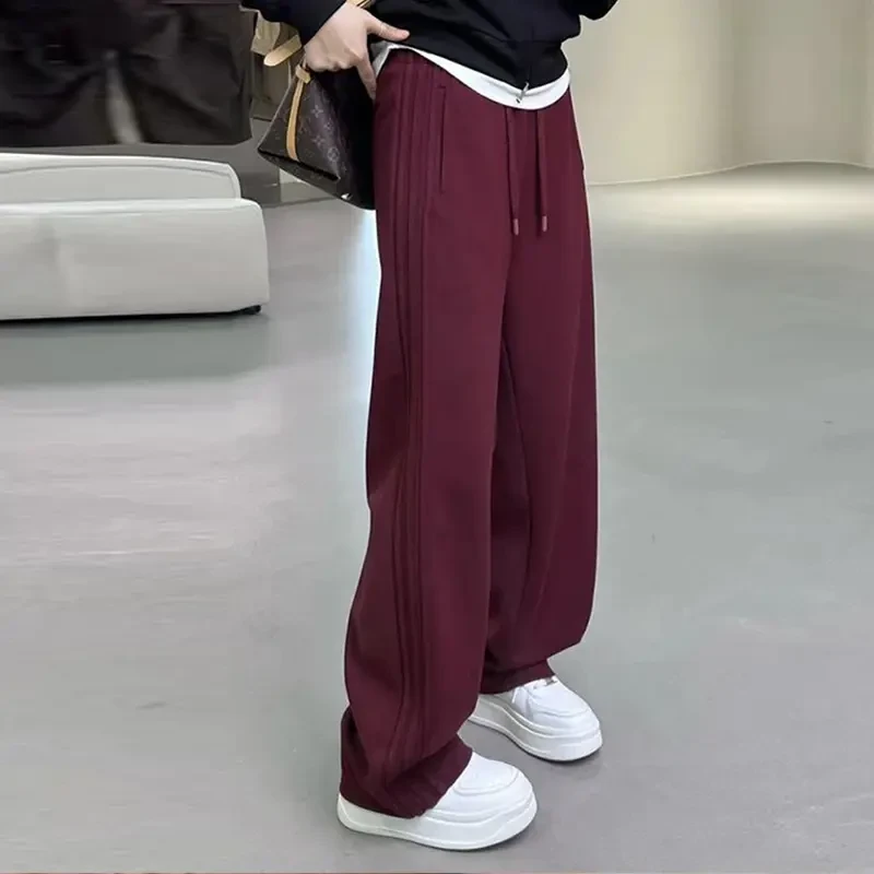 安哥拉红大码香蕉镰刀裤女秋冬新显瘦休闲运动卫裤宽松阔腿弯刀裤