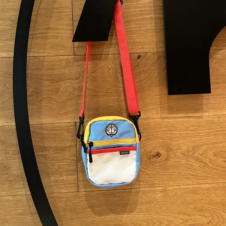 可爱卡通刺绣撞色蓝胖子包单肩斜挎包腰包多功能证件收纳包