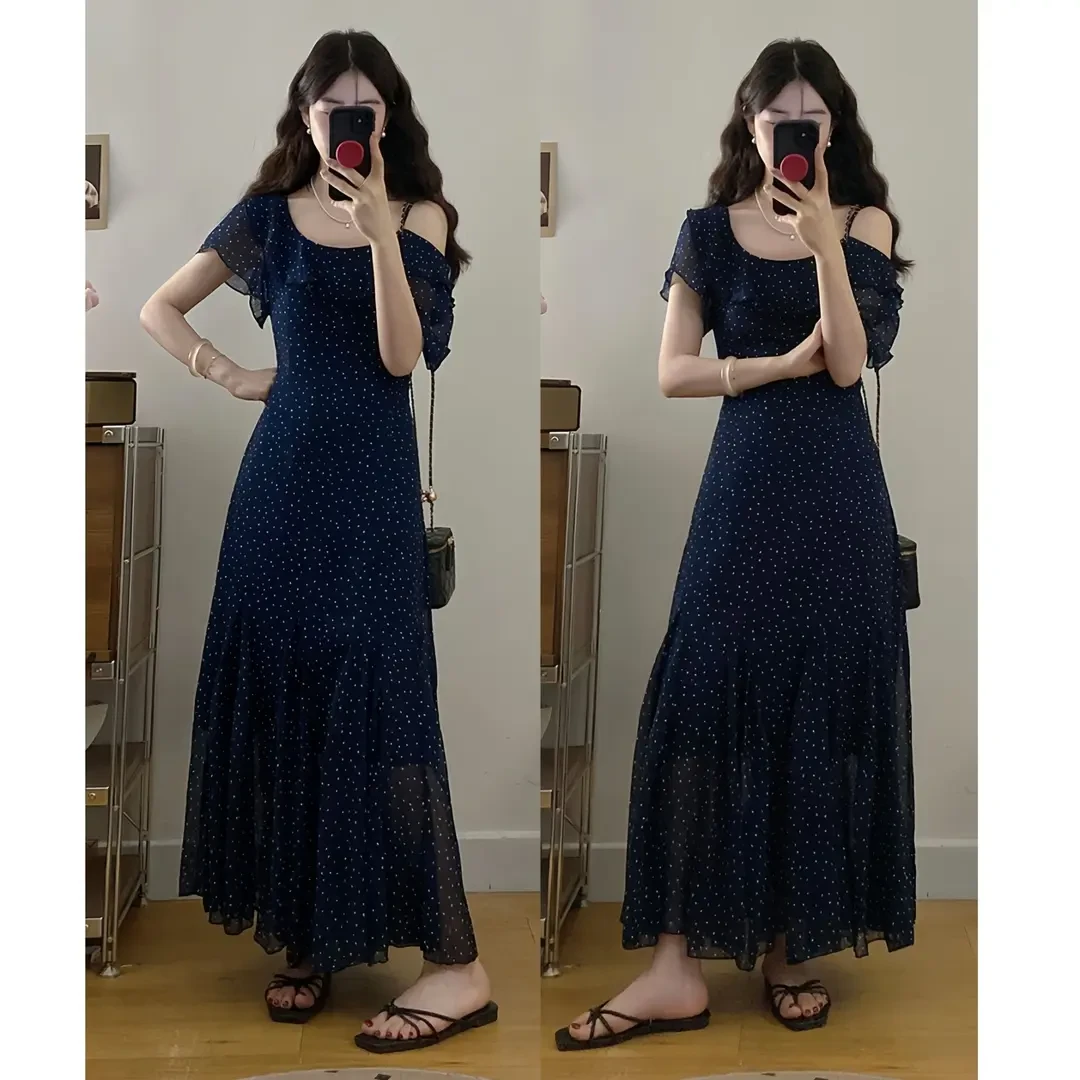 蓝色度假风连衣裙夏季2025法式复古不规则波点设计气质显瘦长裙子