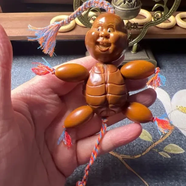 橄榄核雕刻龟仙人手把件无打孔可盘玩文玩