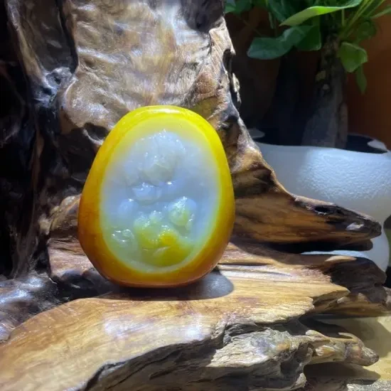 新疆和田玉，224克，人财两旺手把件.