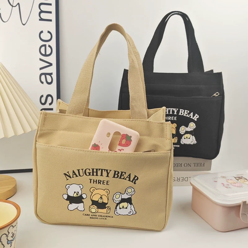 高颜值帆布手提包外出简约小巧立体拎包通勤加厚上班便当饭袋W