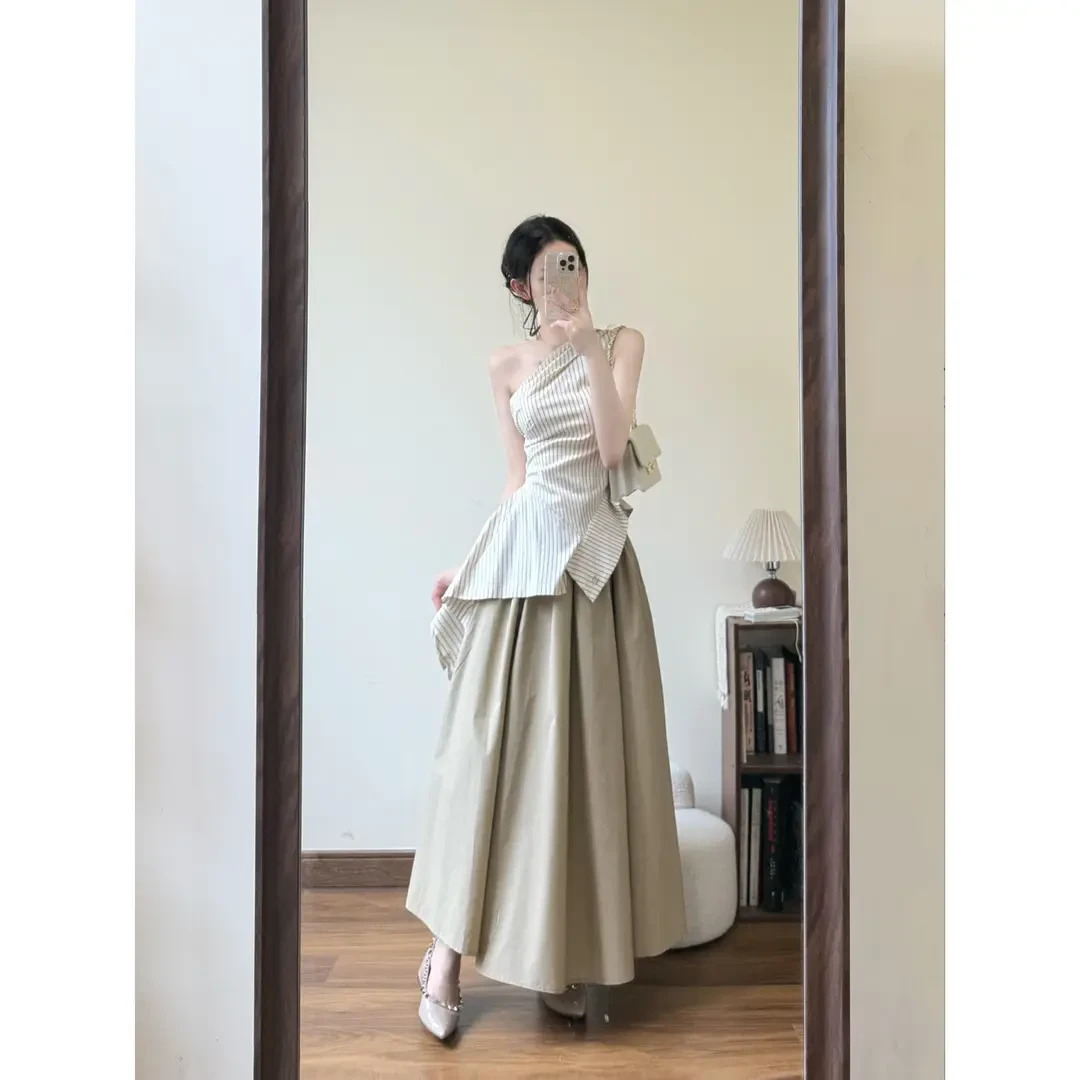 千金清冷感贵系衣服小众不规则斜肩条纹吊带上衣女高腰A字伞裙