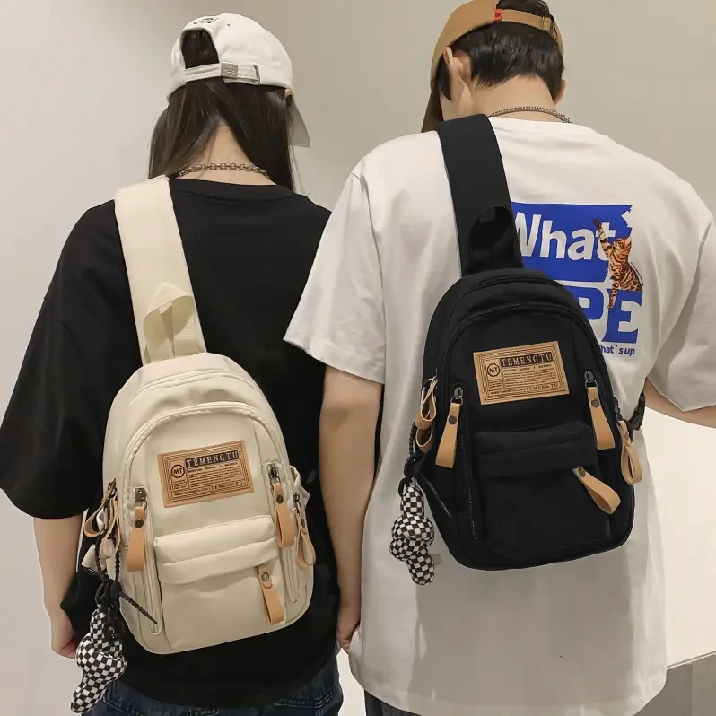 新款斜挎包男生潮牌休闲小背包日系百搭单肩包多功能男士运动胸包