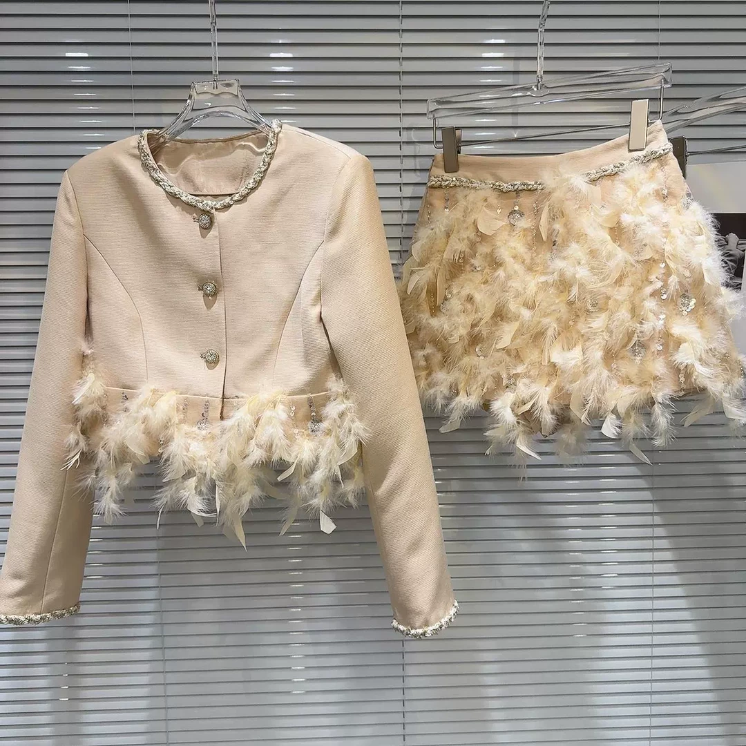 网红同款2025春季新款小香风链条边羽毛下摆短外套上衣+短裙套装
