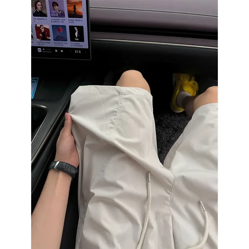 夏季潮牌美式斜切休闲短裤男款拼接宽松薄款速干冰丝运动五分裤子