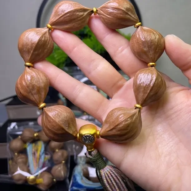 梅林铁核2.4四花橄榄核雕8