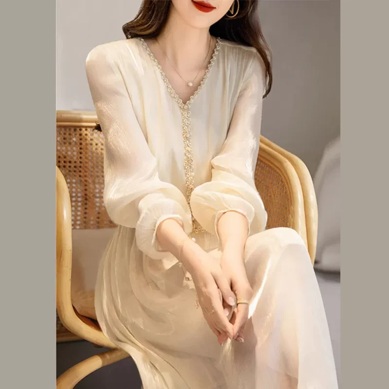 欧洲站高级感V领连衣裙女2025新款春夏秋季时尚简约重工中长裙子