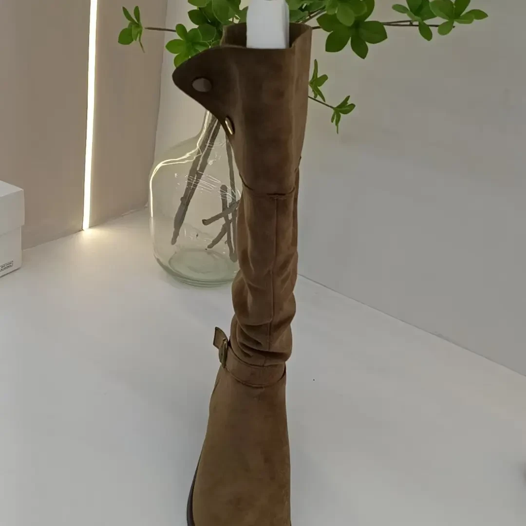 【酷时典】的新款皮绒时尚粗跟时装百多款的女士靴子