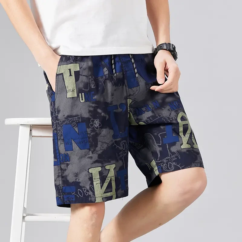 2025年夏新款潮牌印花短裤男士涂鸦休闲百搭文艺宽松五分运动速干