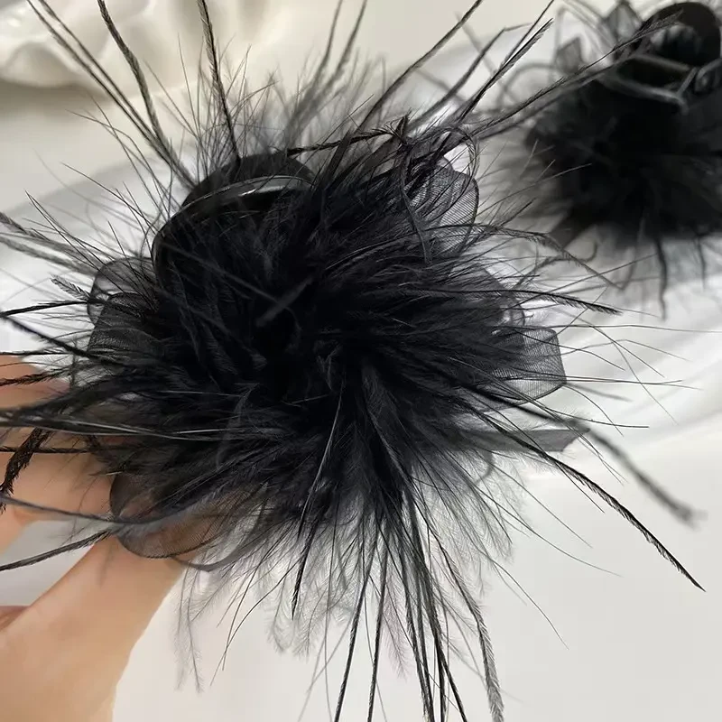 诗泊雅时尚羽毛抓夹黑色显发量女后脑勺毛毛新款高级感鲨鱼夹头饰