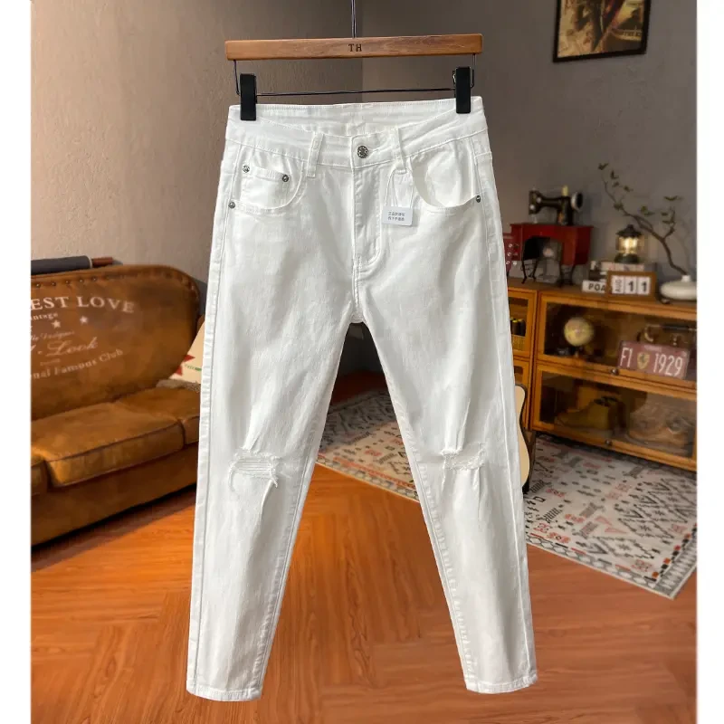 高级感个性设计破洞弹力小脚白色九分牛仔裤男春夏季百搭潮牌男裤