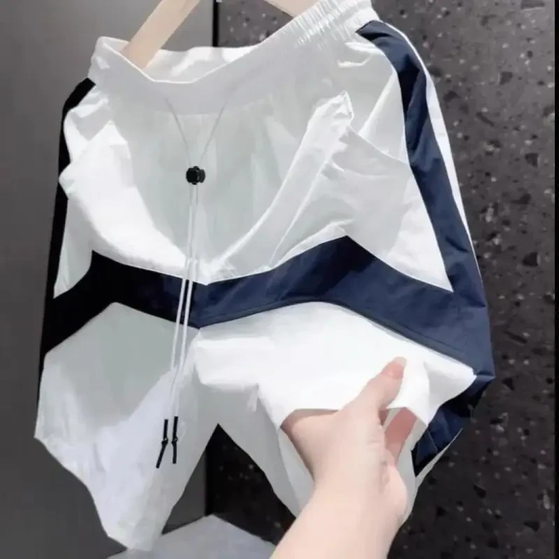 夏季男士拼接撞色设计感松紧腰抽绳潮流休闲宽松短裤拼色速干中裤