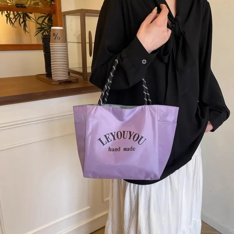 多巴胺纯色防水布手提袋饭盒包上班通勤便携手提包外出百搭妈咪包