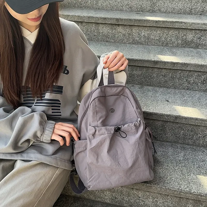 日系纯色户外登山包女轻便休闲双肩背包轻量化短途旅行运动包TJ