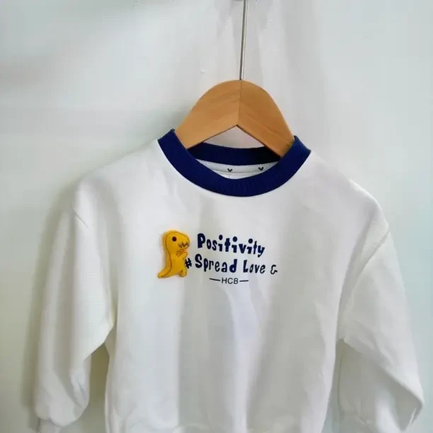 春季长袖白色中童卡通T恤韩版春秋女童印花打底衫印花