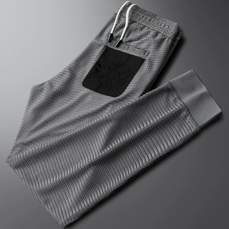 轻奢夏季薄款灰色休闲运动裤男修身小脚束腿提花刺绣跑步卫裤潮流