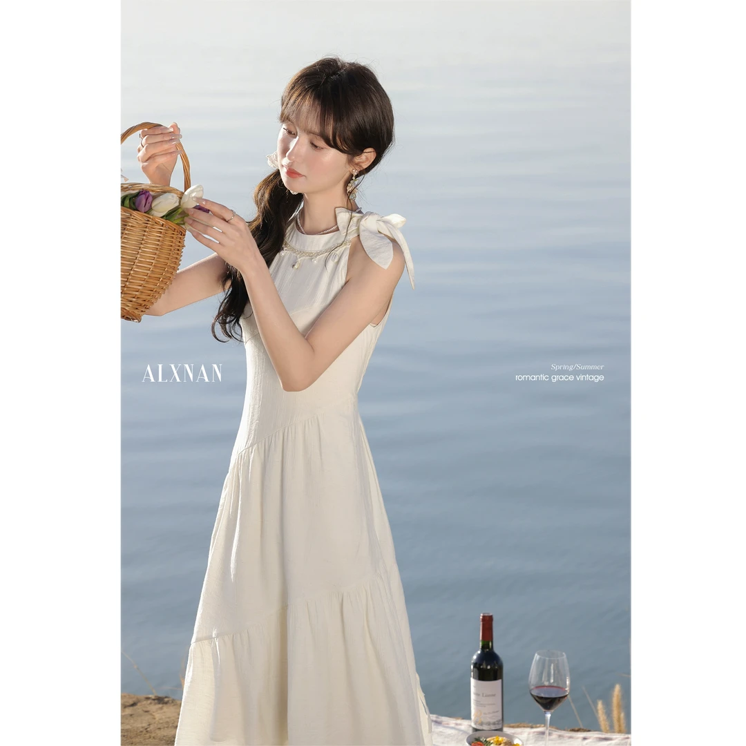 鹿向南【月下茶花】25年春季新款气质杏色连衣裙开衫两件套L53230