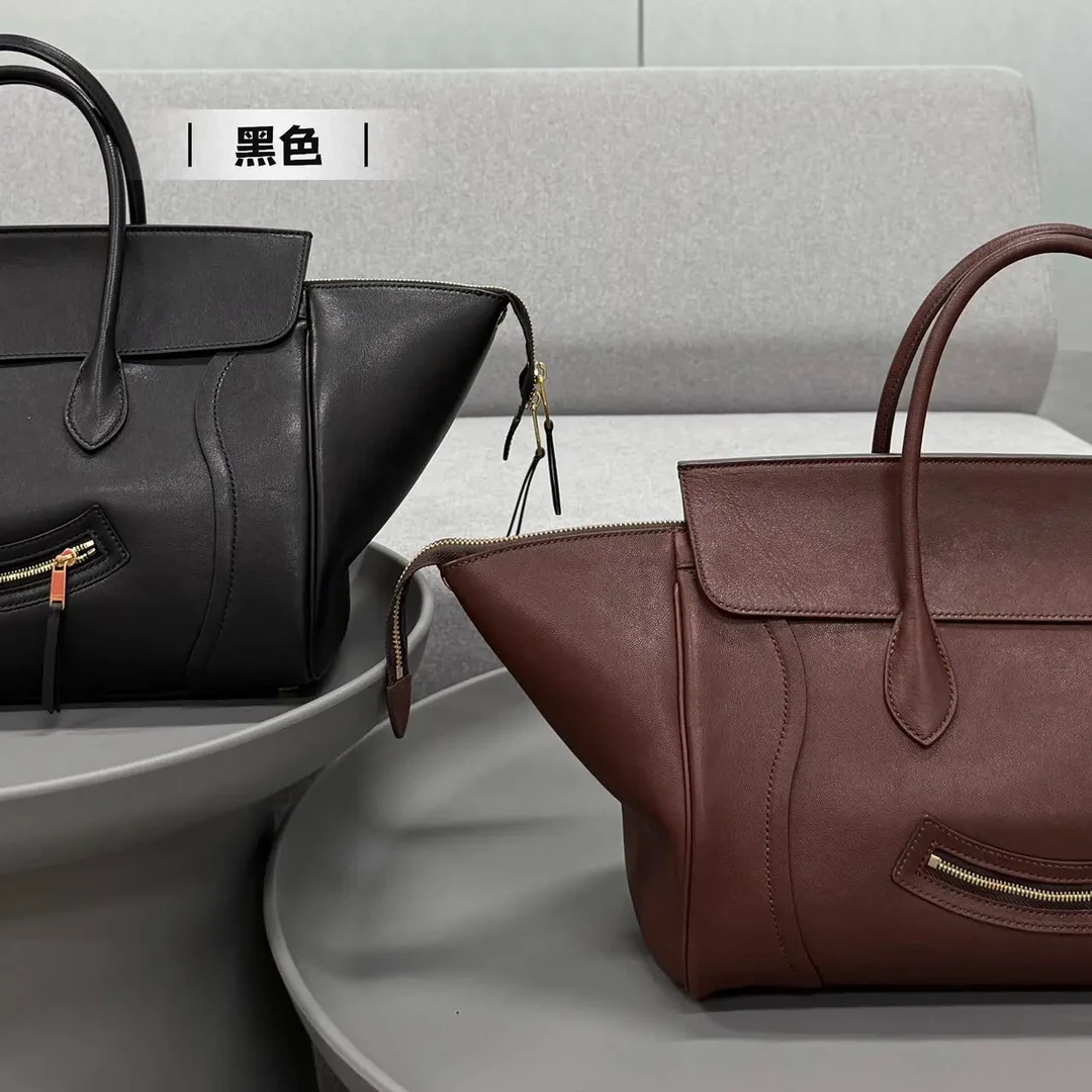 趣味笑脸拉链翅膀手提包长手柄简约风轻奢复古百搭女士包