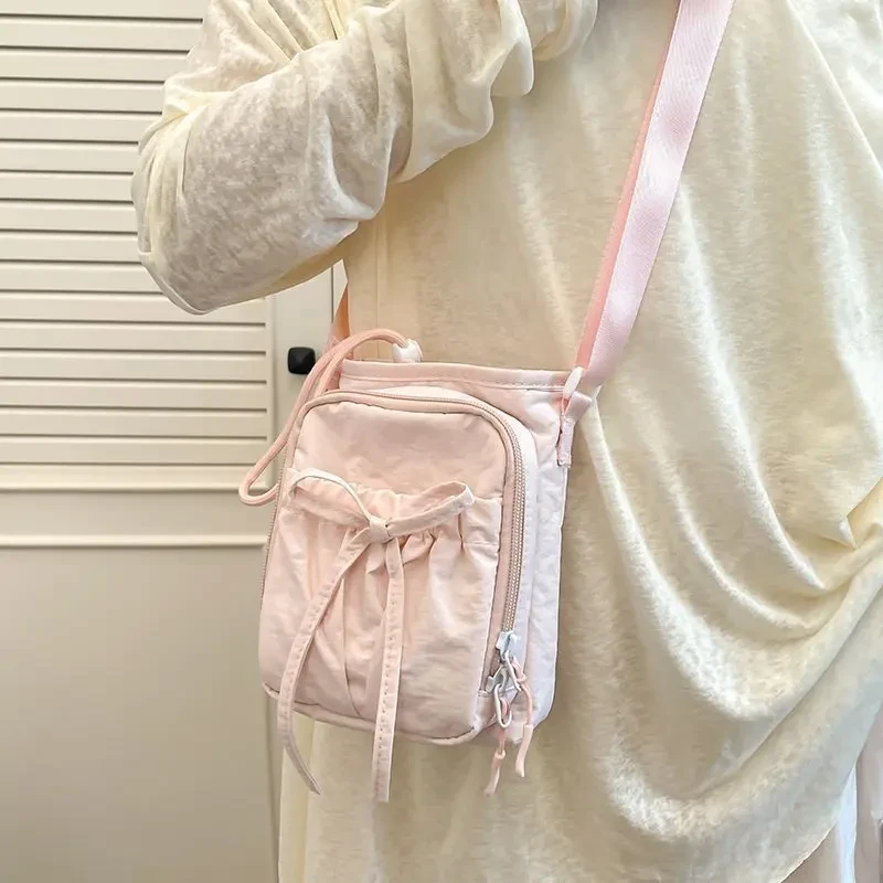 2025新款户外轻便蝴蝶结束口斜挎包防水手机包保温水壶女单肩包TJ