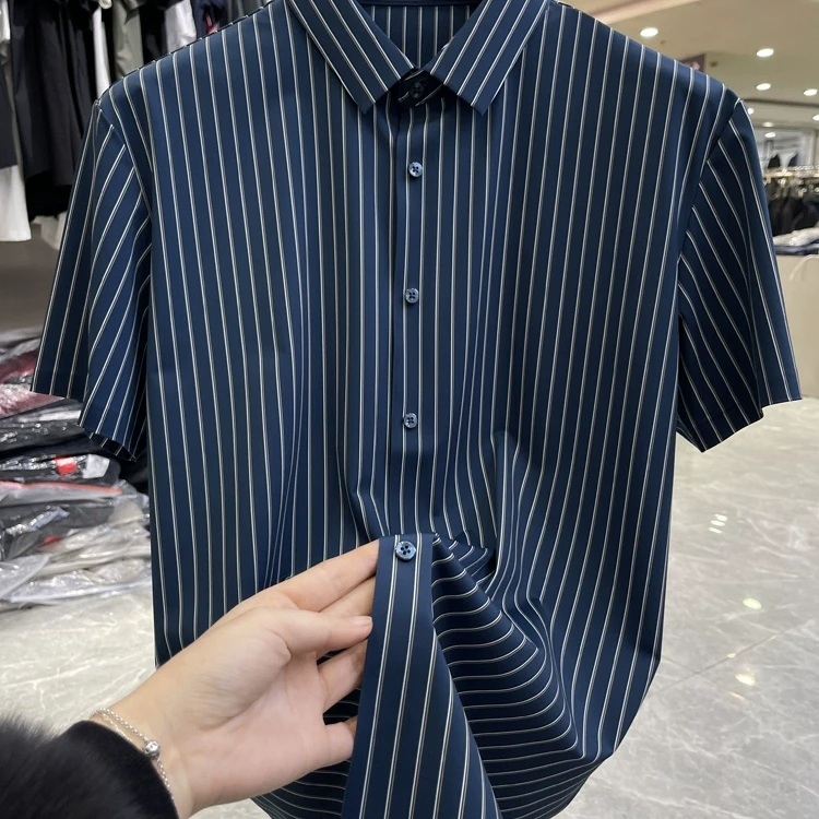 （002)夏新休闲百搭舒适衬衣男中年衬衫短袖冰丝一线品牌剪标尾货