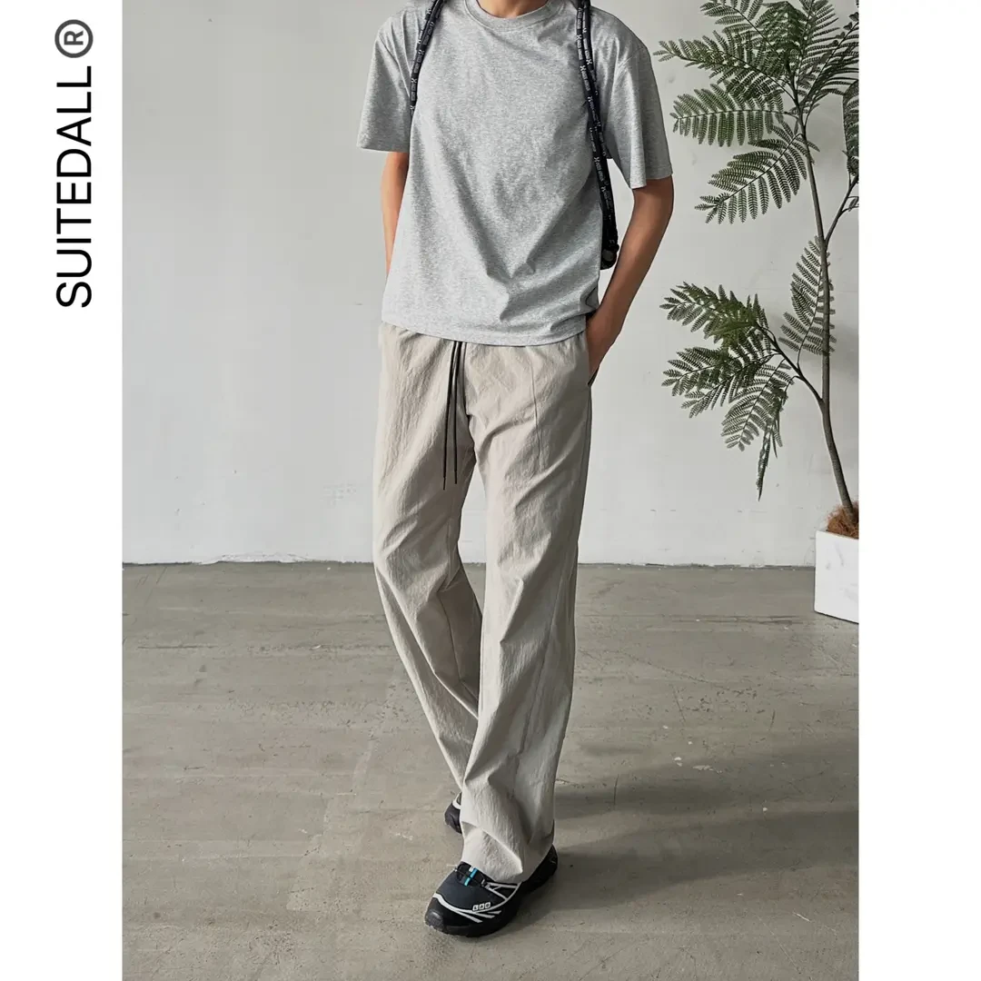 梭织速干长裤“2021M”直筒微喇宽松休闲运动夏季薄款长裤