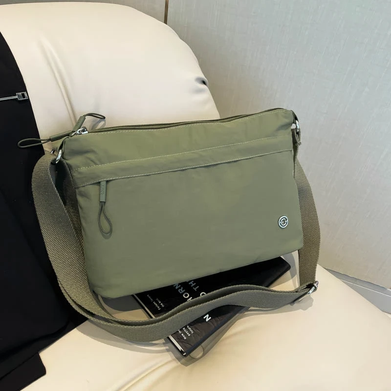 多层包包大容量男女同款轻便休闲百搭单肩包斜挎包多隔层大容量包