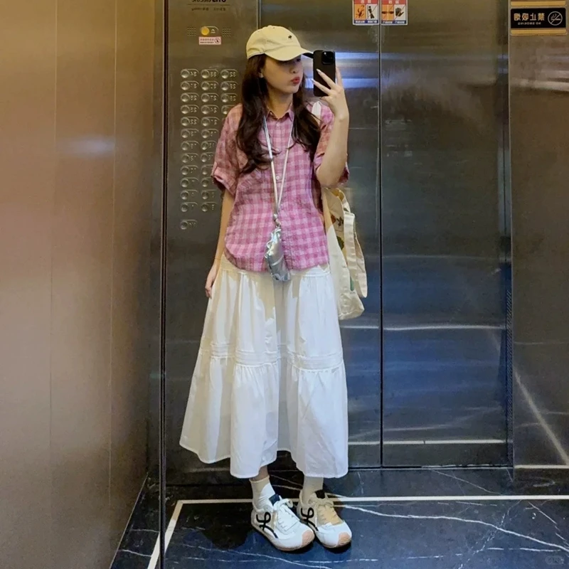 白色宽松蛋糕裙a字半身裙女夏季2025新款高腰显瘦大摆中长裙半裙