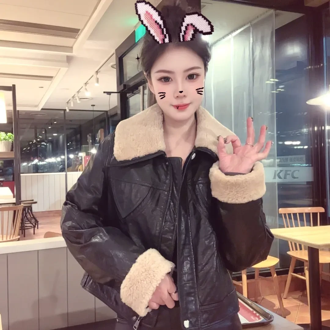 欧洲站高端皮毛一体翻领真皮羽绒服女短款宽松版复古机车外套
