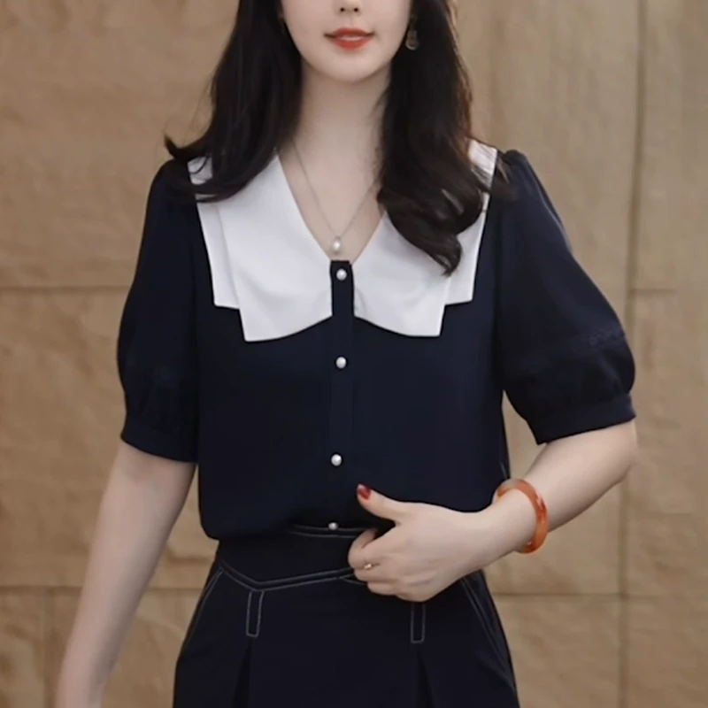 藏蓝色娃娃领衬衫女士夏季2025宽松型休闲减龄洋气设计感显瘦上衣