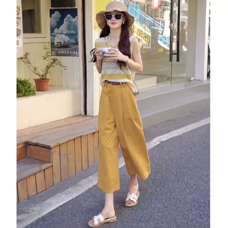 减龄搭配一整套夏装冰丝镂空无袖条纹针织背心+高腰休闲裤两件套