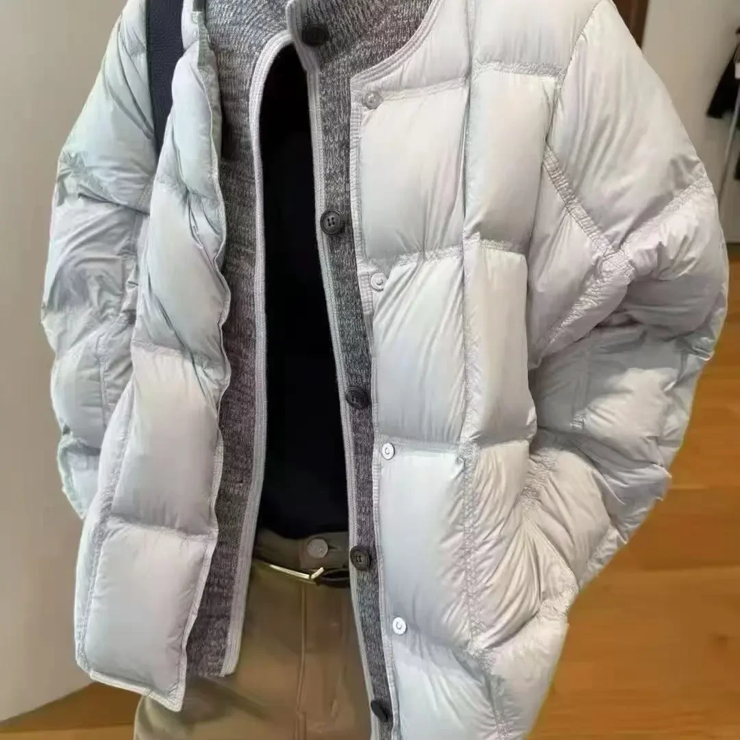 冬季潮流百搭针织拼接假两件立领羽绒服
