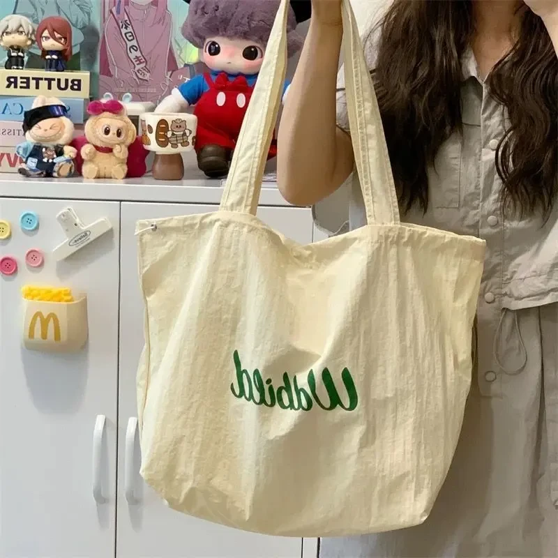 松弛感托特包女2025新款抽绳帆布包通勤轻便手提袋大容量单肩包LQ