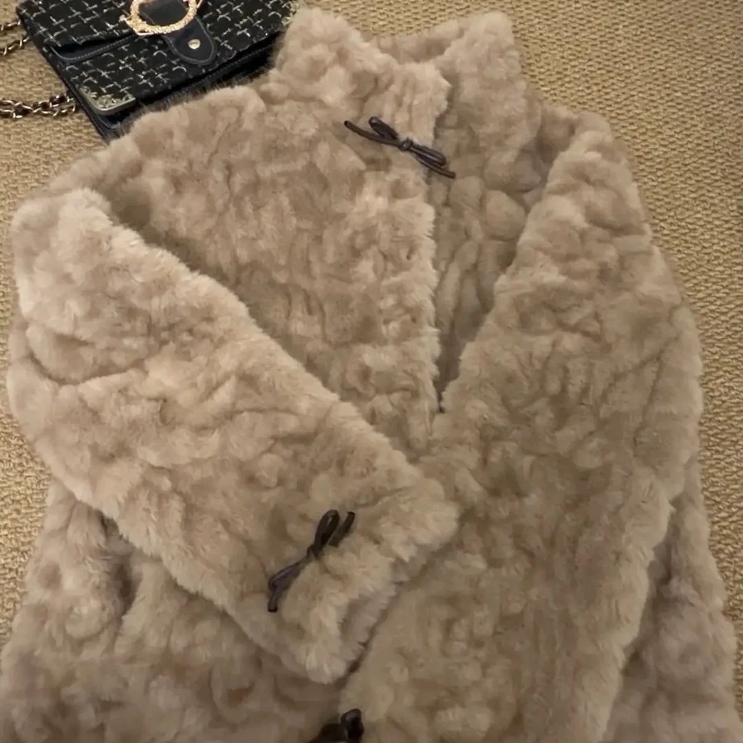 韩版时尚立领环保皮毛一体保暖女士冬季加厚外套网红