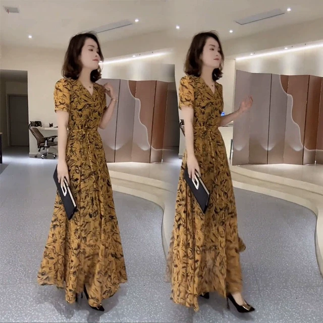 温柔风碎花短袖连衣裙子女夏季2025年新款高级感茶歇法式收腰长裙