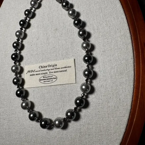 施家珍珠水晶手机链