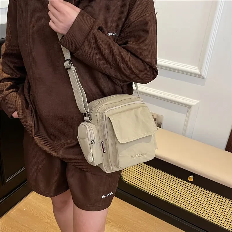 百搭相机包尼龙小方包多功能大容量通勤迷你手机小挎包防水登山包