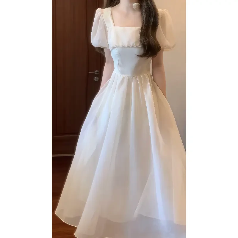 C277夏季法式温柔香槟色方领泡泡袖连衣裙气质伴娘礼服仙女长裙子