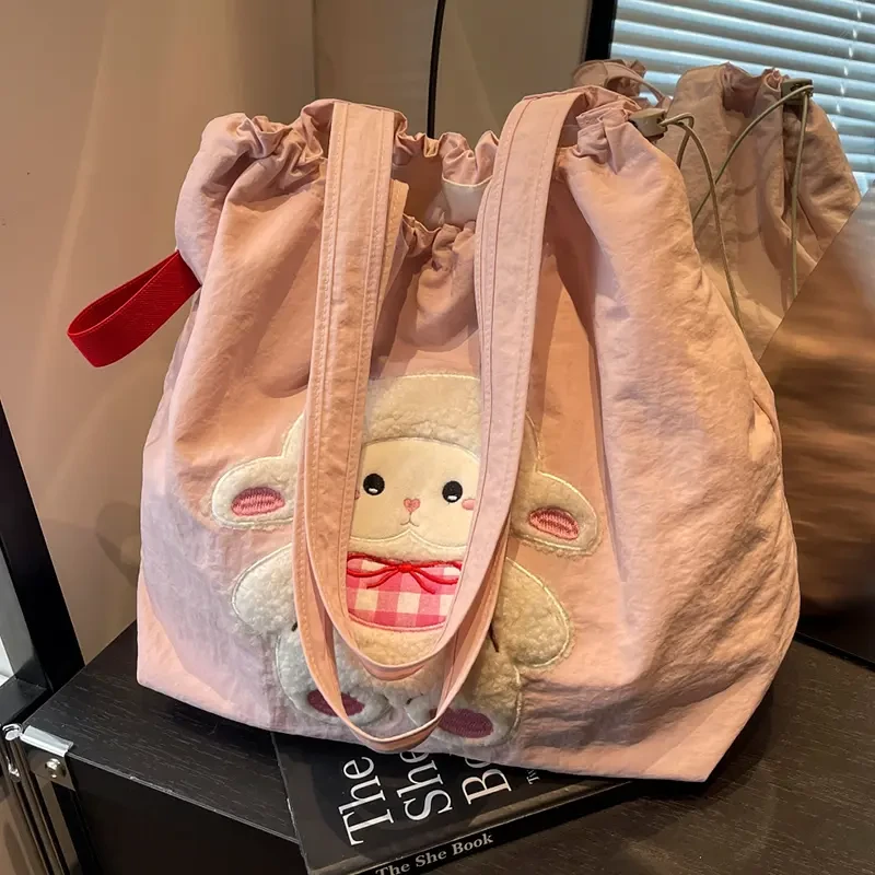 可爱小羊帆布包女夏季新款休闲大容量托特包学生党通勤单肩购物qt