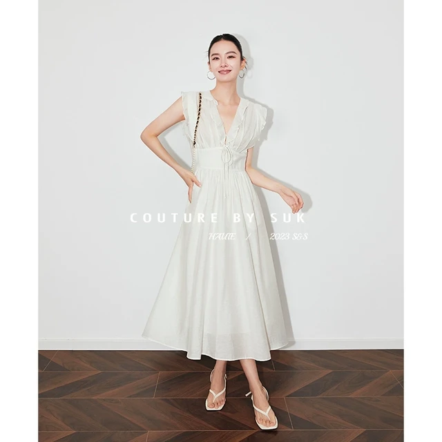 SUK 洁白栀子！2025新款夏连衣裙女白色中长款V领无袖度假风裙子