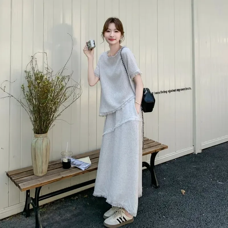 2025初夏新款穿搭女灰色小香风不规则修身上衣高腰显瘦半身裙套装